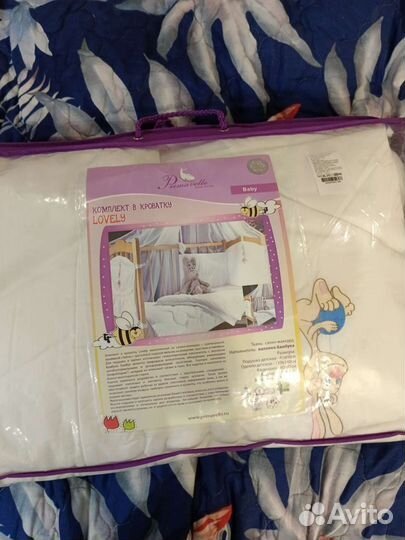 Комплект в кроватку новый