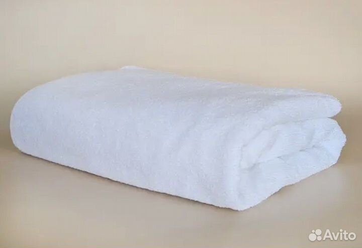 Махровые полотенца белые для гостиниц