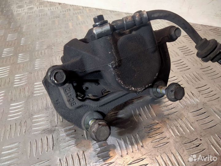 Суппорт передний правый Опель Инсигния