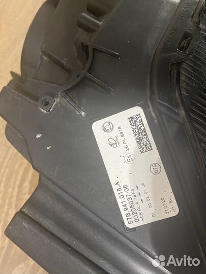 Фара левая Skoda Karog