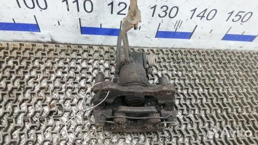 Суппорт тормозной задний левый nissan primera P12