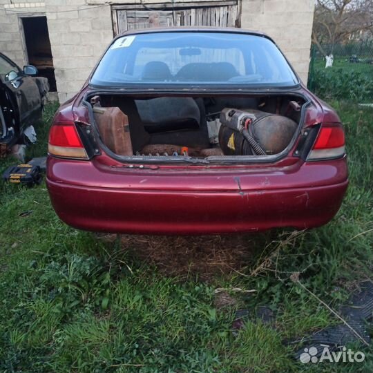 Бампер задний Mazda 626 GE