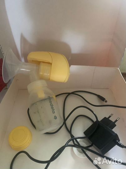 Молокоотсос medela электрический