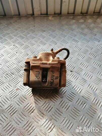 Суппорт тормозной передний правый Renault Logan