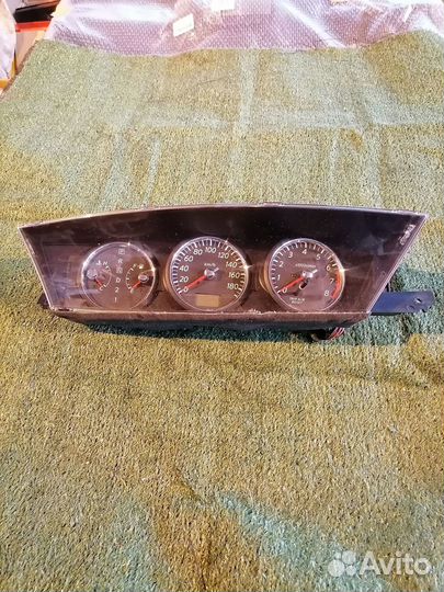 Спидометр (панель приборов) 24820AU020 Nissan Prim