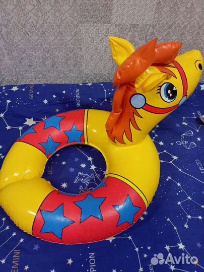 Круг для плавания, ласты, мяч