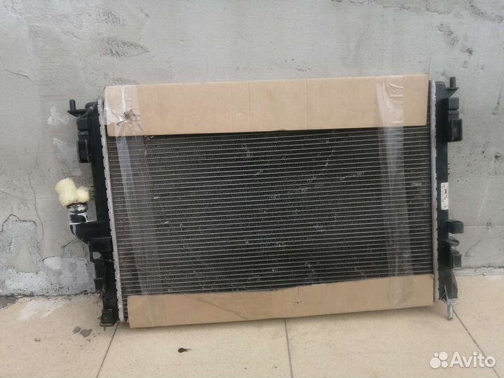 Радиатор охлаждения на renault logan 1 ресталинг