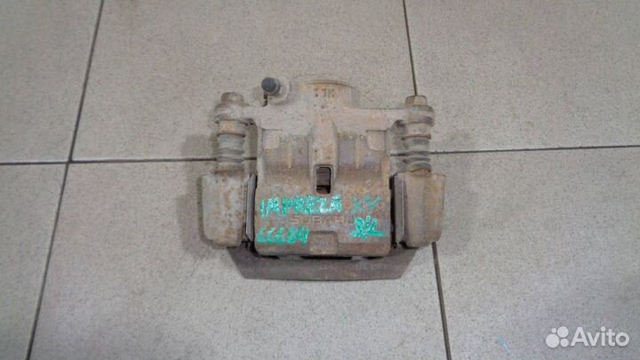 Суппорт задний левый Subaru Impreza 3