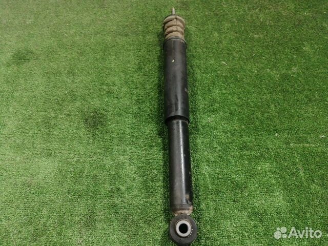 Амортизатор задний левый Nissan Micra K12E CR12DE