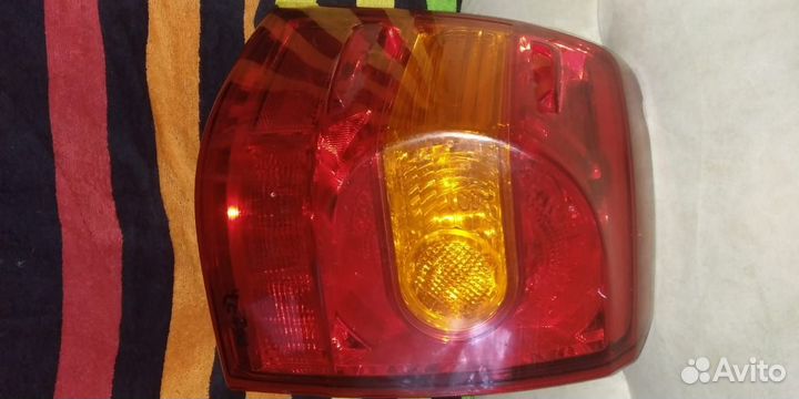 Фонарь левый задний LC200