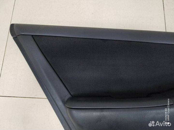 Обшивка двери задней левой Toyota Corolla E120 200