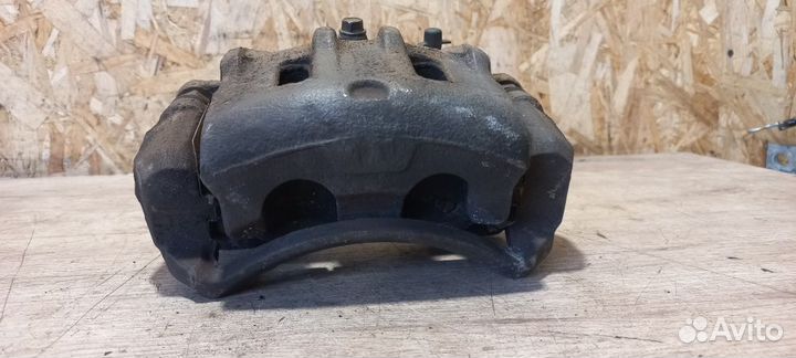 Суппорт тормозной передний левый Opel Antara