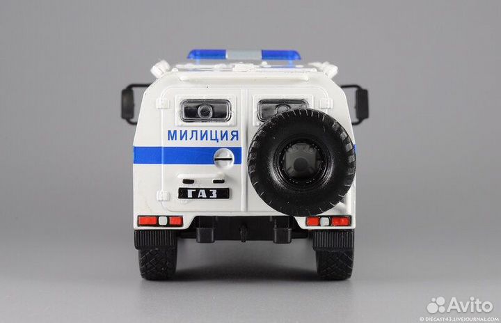 Модель автомобиля Газ Тигр Омон милиция 1:43