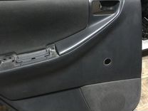 Обшивка боковой двери задняя левая Toyota E120