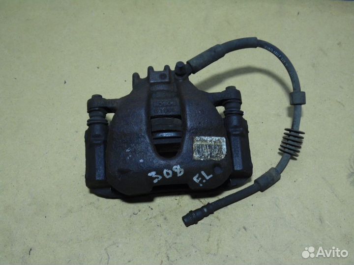 Суппорт передний левый Пежо 308