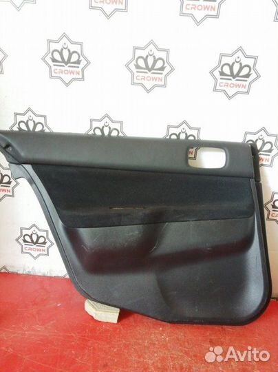 Облицовка двери задняя левая Mitsubishi Lancer