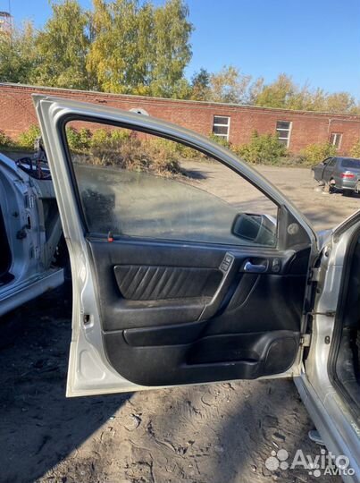 Дверь передняя левая Opel Astra G