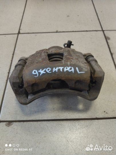 Суппорт тормозной передний левый Daewoo Gentra