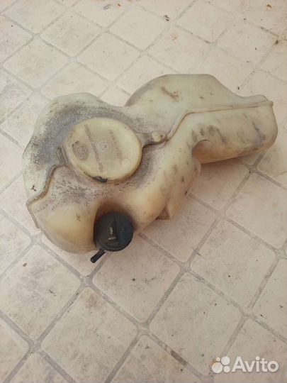 Бачок омывателя в сборе на дэу эсперо