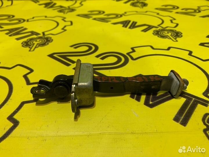 Ограничитель двери передний левый Nissan Primera