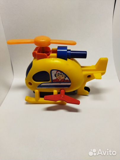 Игрушка механическая,заводной вертолет Завод Парус