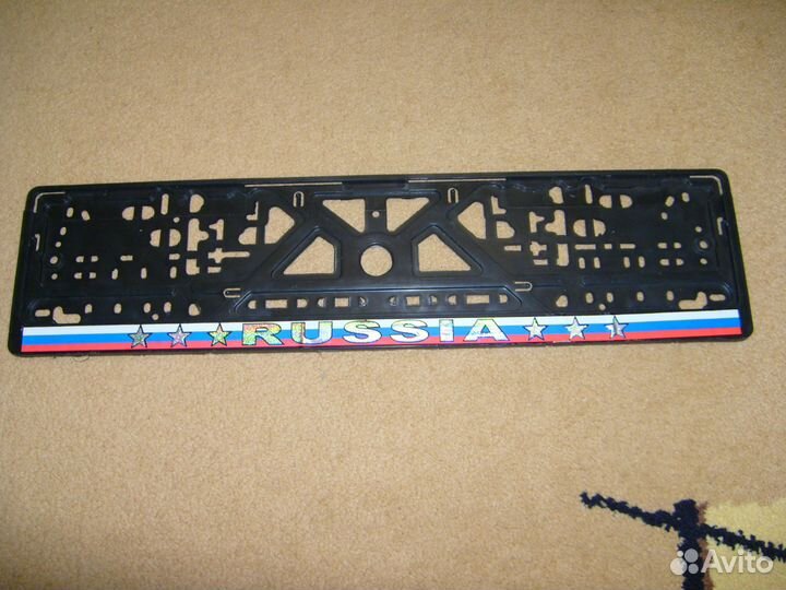 Рамка номерного знака пластмассовая с защёлкой пол