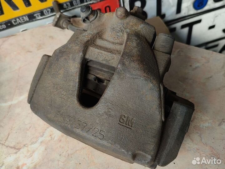 Opel astra Н тормозной суппорт