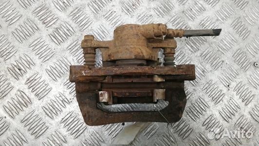 Суппорт тормозной задний левый subaru impreza 3 (K