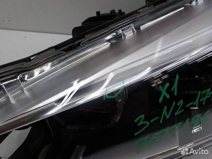 Фара левая BMW X1