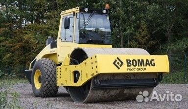Машинист катка
