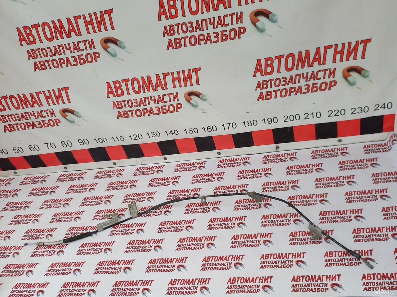 Трос ручника левый Форд Мустанг 6 2.3 14-23