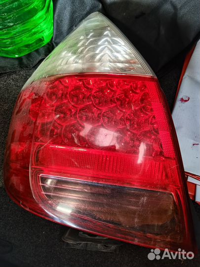 Фара левая задняя хонда фит