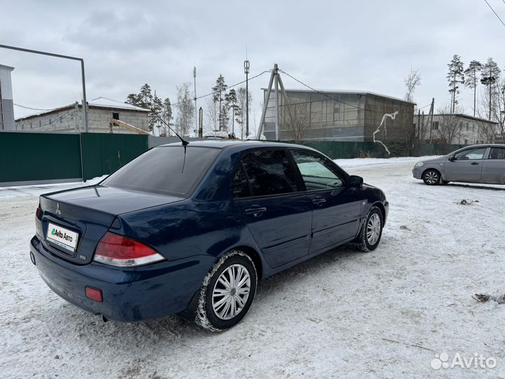 Mitsubishi Lancer 1.6 AT, 2005, 273 300 км