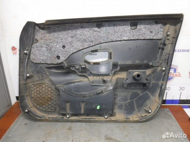 Обшивка двери передняя левая Nissan Almera G15 K4M