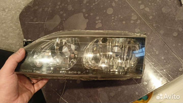Фара левая Toyota Levin Trueno ae110/ae111