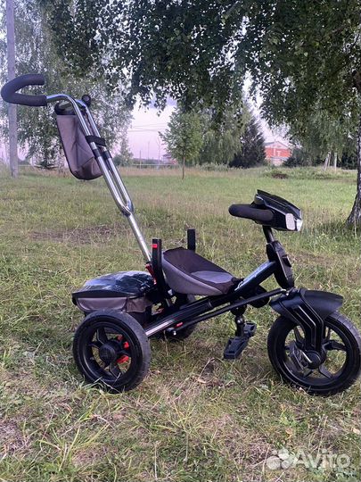 Велосипед-коляска с ручкой