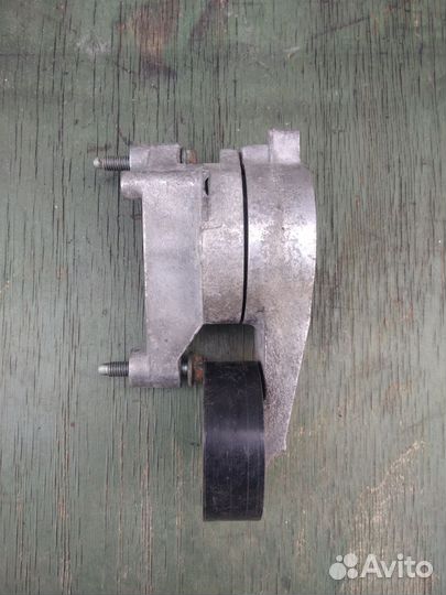 Натяжной ролик VW Passat b6 BKP tdi 2л