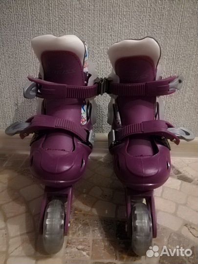 Роликовые коньки