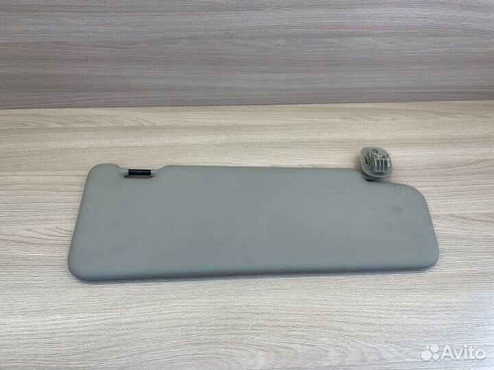 Козырек солнцезащитный левый Renault Logan