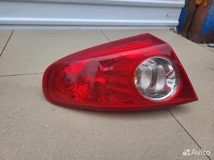 Фонарь задний левый наружный Chevrolet Лачетти