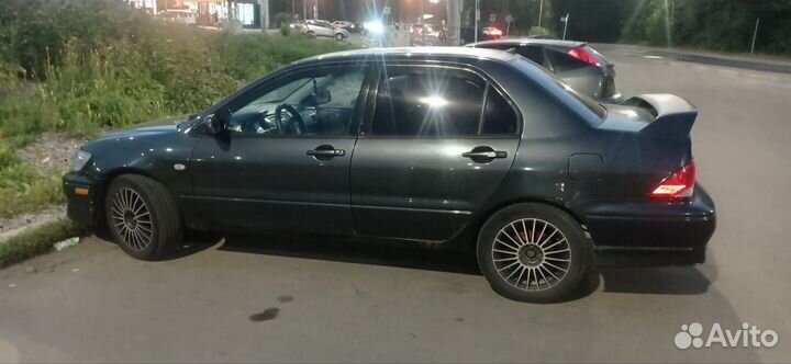 Mitsubishi Lancer 2.0 МТ, 2002, 200 386 км