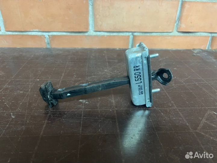 Ограничитель двери задний правый Land Rover