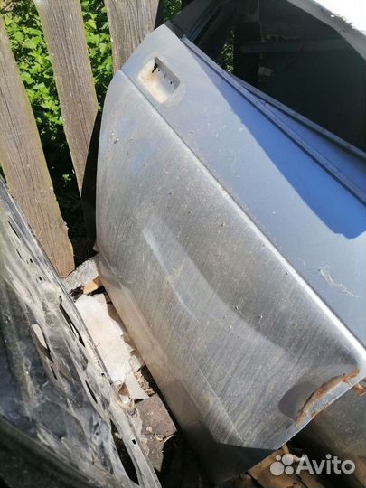 Двери рено логан