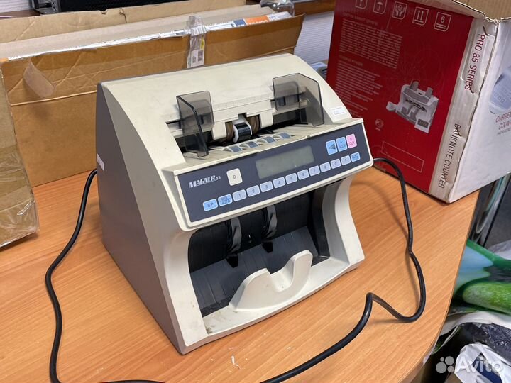 Машинка для подсчета банкнот
