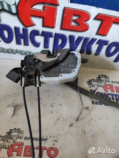 Замок боковой двери передний левый Nissan Almera