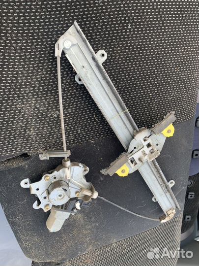 Стеклоподъемник двери задней lancer 9