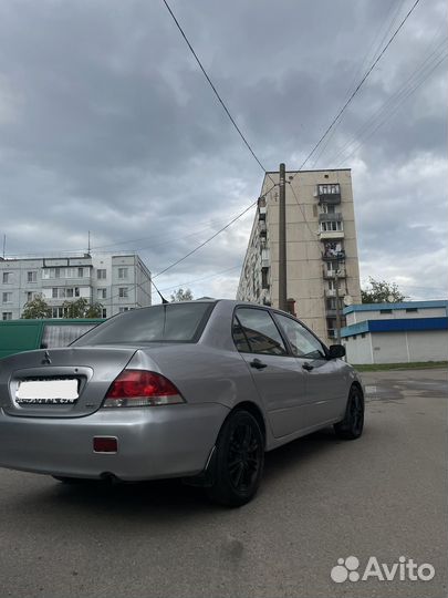 Mitsubishi Lancer 1.6 МТ, 2003, 200 000 км