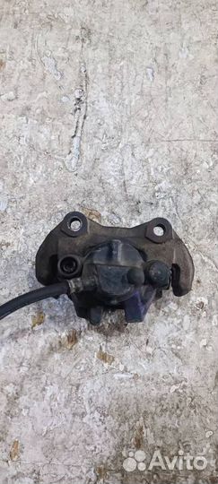 Суппорт задний левый