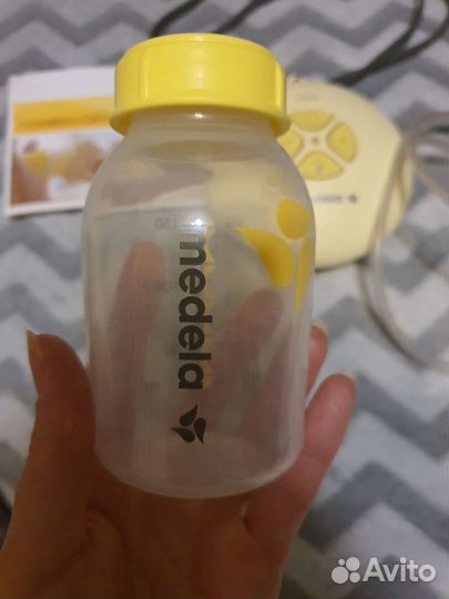 Молокоотсос medela электрический