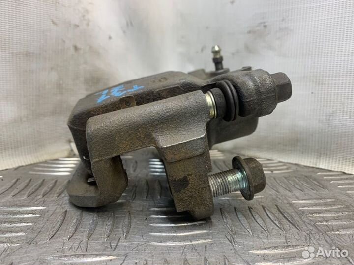 Суппорт тормозной задний левый Nissan X-Trail T31